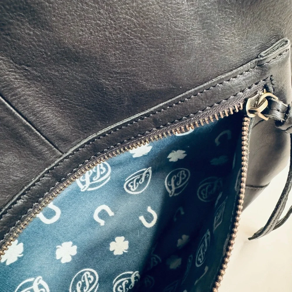 Lucky Brand Abbey fold over black leather studded messenger bag.Very Clean.